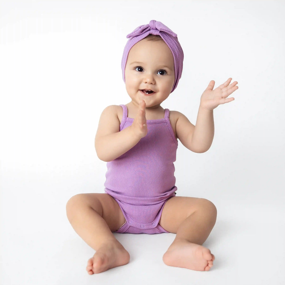 Ribbed Spaghetti Strap Bodysuit in Poi
